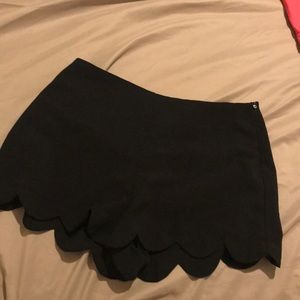 Black scalloped shorts